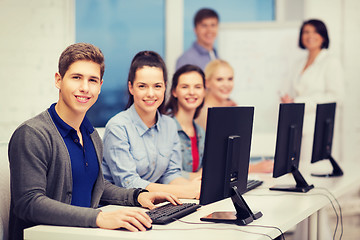 Image showing students with computer monitor at school