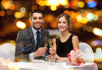 Image showing couple with glasses of champagne at restaurant