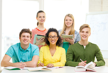 Image showing students with textbooks and books at school