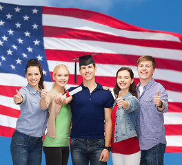 Image showing group of students with diploma showing thumbs up