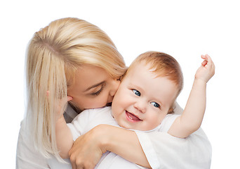 Image showing happy mother kissing smiling baby