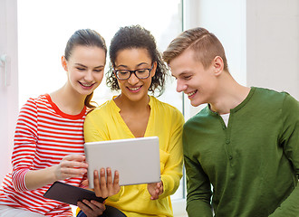 Image showing smiling students with tablet pc computer