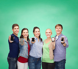 Image showing students showing blank smartphones screens