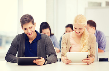 Image showing students looking at tablet pc in lecture at school