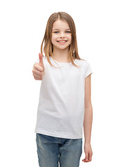 Image showing little girl in blank white tshirt showing thumbsup