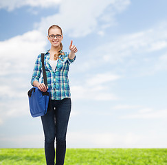 Image showing student with laptop bag showing thumbs up