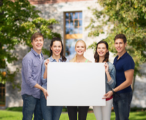 Image showing group of standing students with blank white board