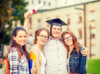 Image showing students or teenagers with files and diploma