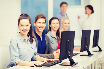 Image showing students with computer monitor at school