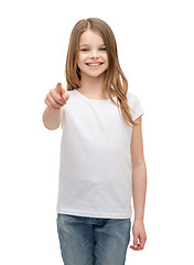 Image showing little girl in blank white t-shirt pointing at you