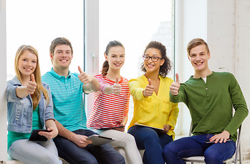 Image showing smiling students with tablet pc computer