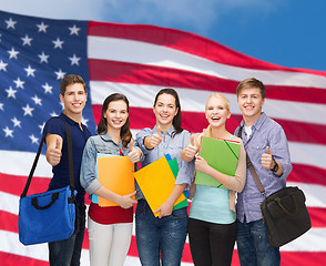 Image showing group of smiling students showing thumbs up