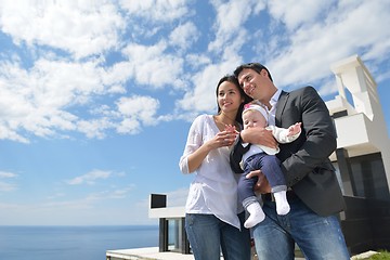 Image showing happy young family at home