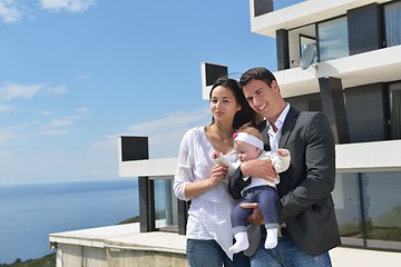 Image showing happy young family at home