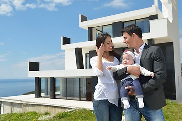 Image showing happy young family at home