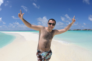 Image showing young man have fun and relax on beach