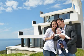 Image showing happy young family at home