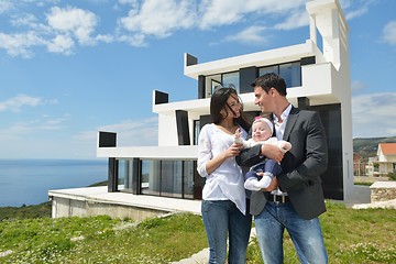 Image showing happy young family at home