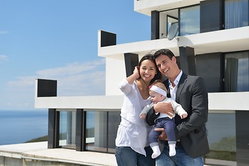 Image showing happy young family at home