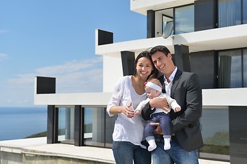 Image showing happy young family at home