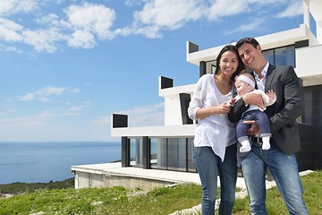 Image showing happy young family at home