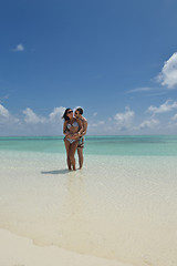 Image showing happy young couple have fun on beach