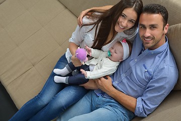 Image showing happy young family at home