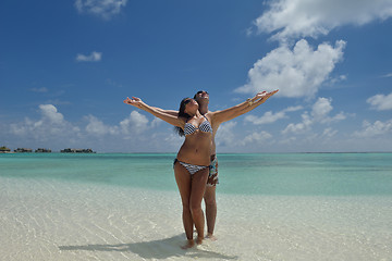 Image showing happy young couple have fun on beach