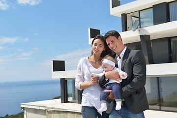 Image showing happy young family at home