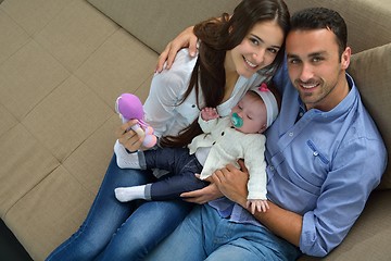 Image showing happy young family at home