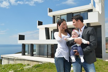 Image showing happy young family at home