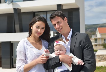 Image showing happy young family at home