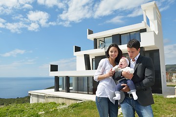 Image showing happy young family at home