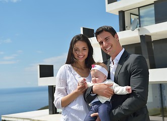 Image showing happy young family at home