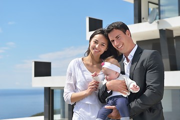 Image showing happy young family at home