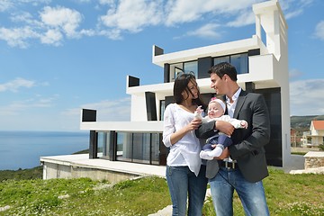 Image showing happy young family at home