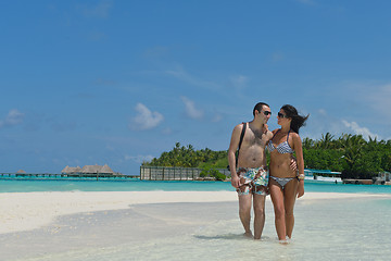 Image showing happy young couple have fun on beach