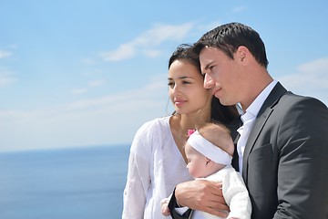 Image showing happy young family at home