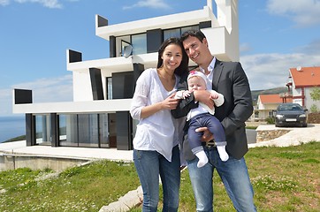 Image showing happy young family at home