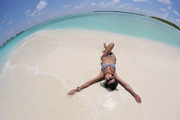 Image showing beautiful young woman  on beach have fun and relax