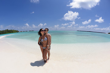 Image showing happy young couple have fun on beach