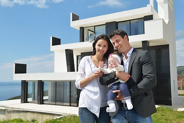 Image showing happy young family at home