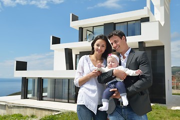 Image showing happy young family at home