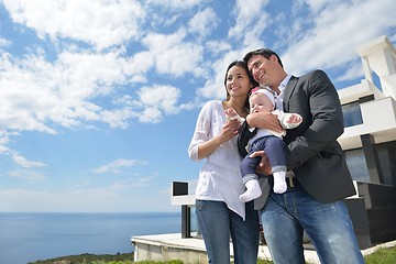 Image showing happy young family at home