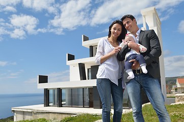 Image showing happy young family at home