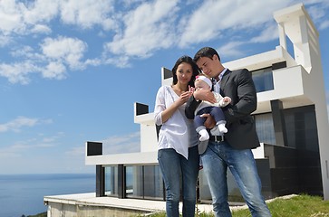 Image showing happy young family at home