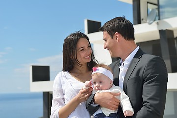 Image showing happy young family at home