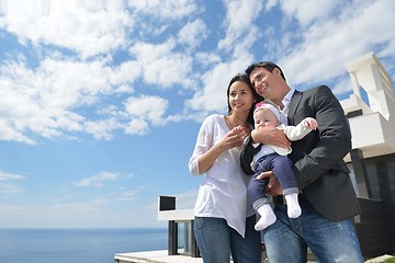 Image showing happy young family at home