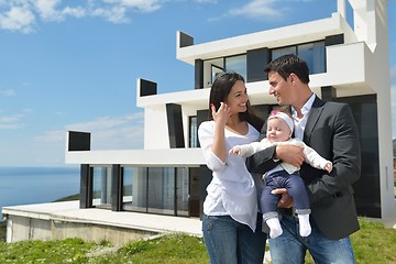 Image showing happy young family at home