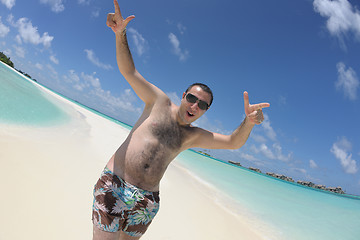 Image showing young man have fun and relax on beach